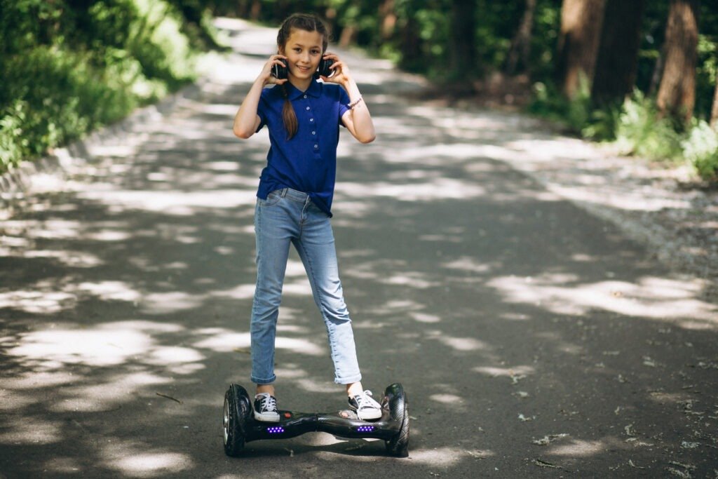 Girl enjoying her hoverboard in the park
