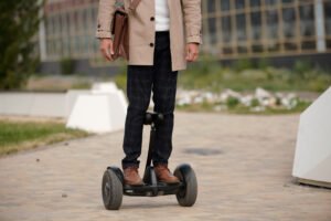 man riding his hoverboard