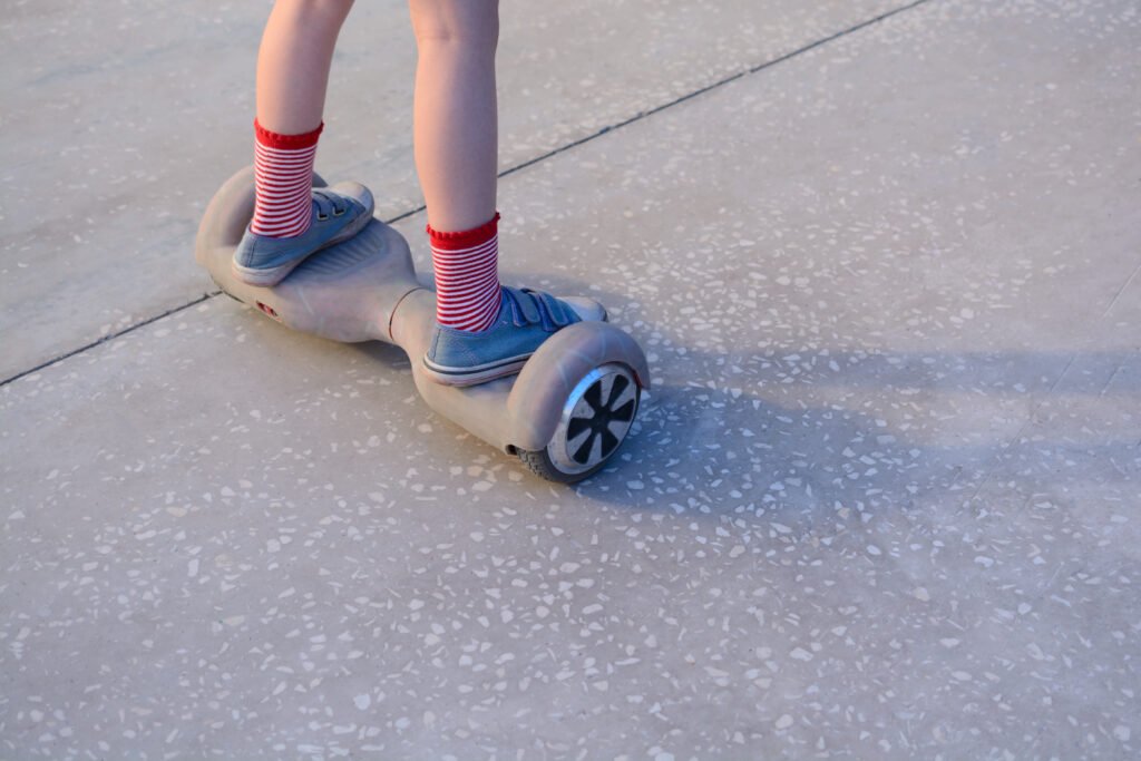 Girl riding on her hoverboard