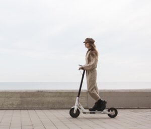 young-woman-riding-electric-scooter Girl riding escooter
